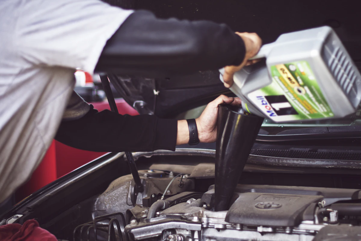 Auto shop owner using newly financed diagnostic equipment