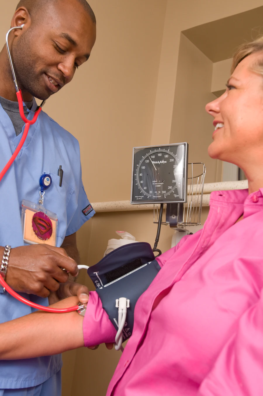 Medical practice owner reviewing expansion plans with an advisor
