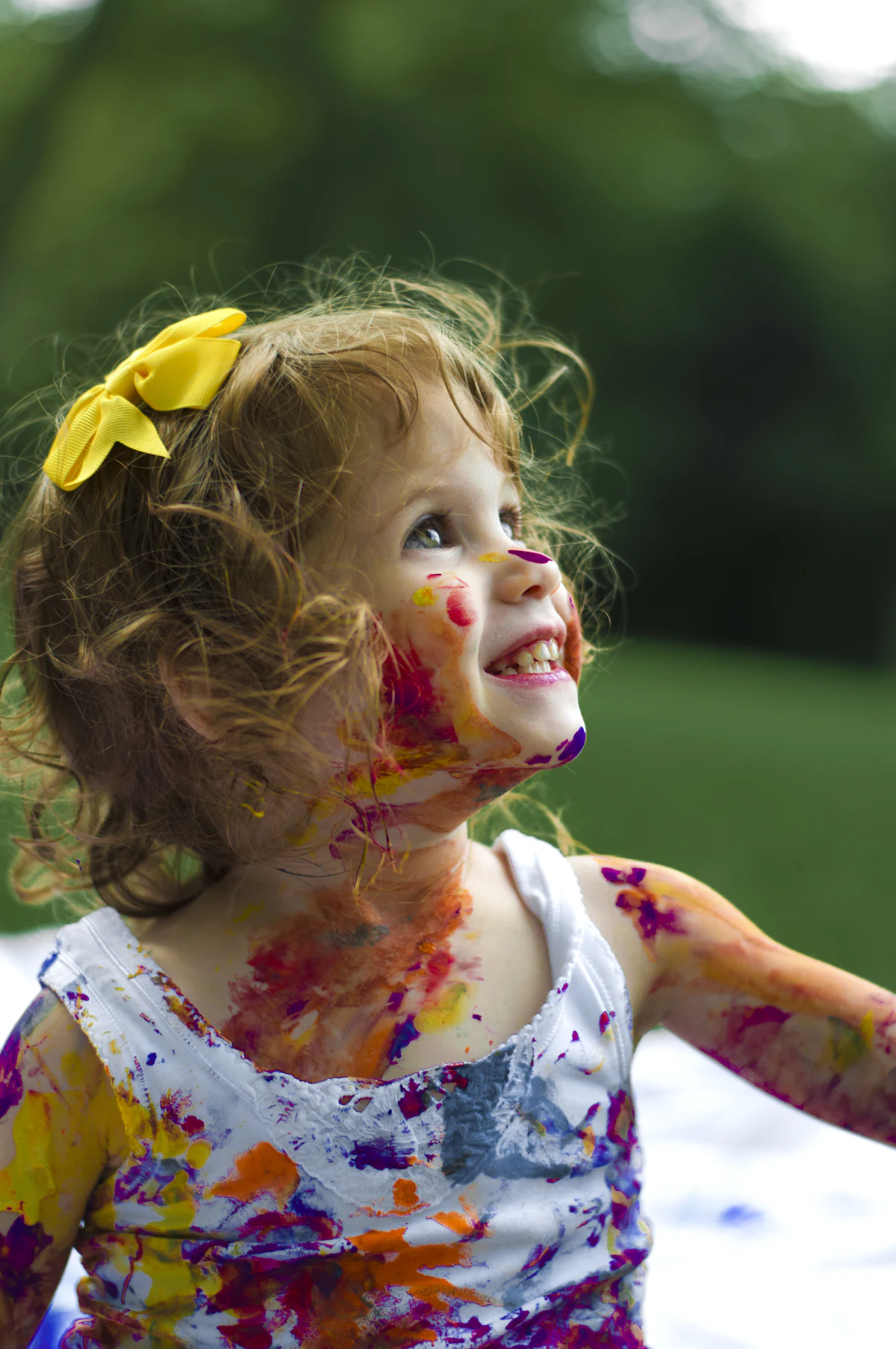 Daycare owner welcoming children to an expanded space