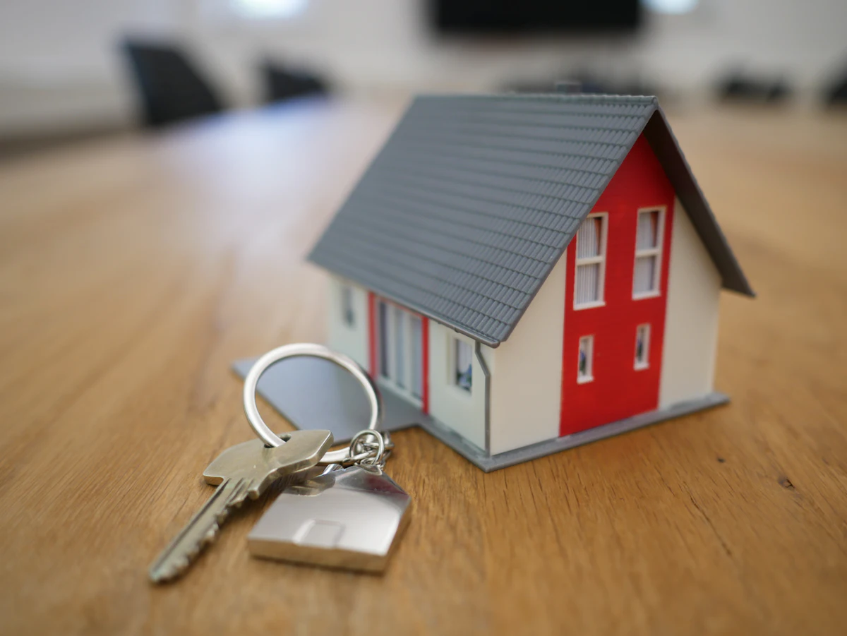 Owner receiving keys to an acquired shop